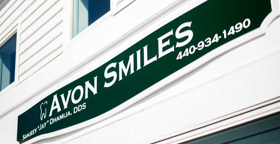 Avon Smiles Sign